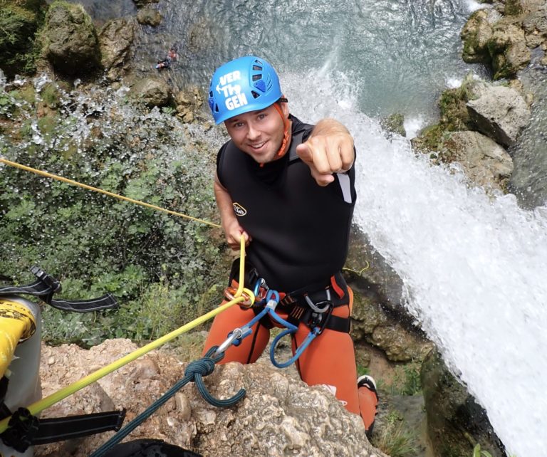 Christian abseiling in valencia during canyoning activity